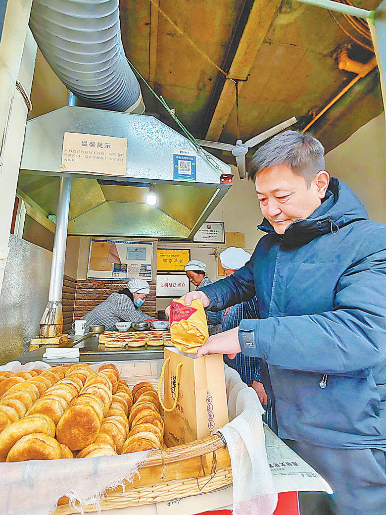 烧饼：祭灶日的烟火传奇龙8国际点此进入靳贤书